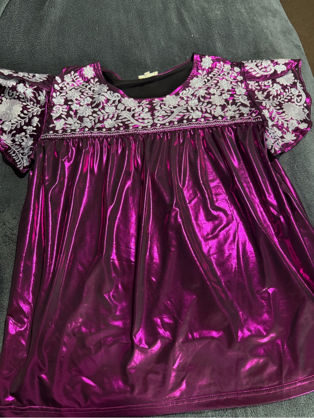 Embroidered women’s metallic top